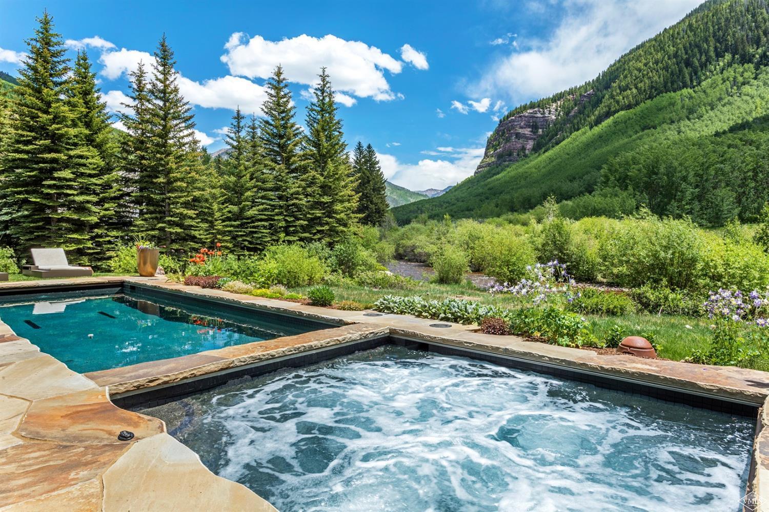 2950 Booth Creek Drive Vail, CO 81657 - Photo 21 of 25 a view of a backyard with swimming pool