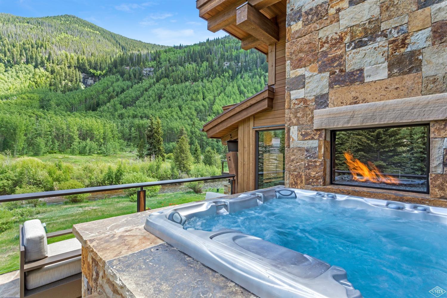 2950 Booth Creek Drive Vail, CO 81657 - Photo 24 of 25 a view of backyard with seating area and green space