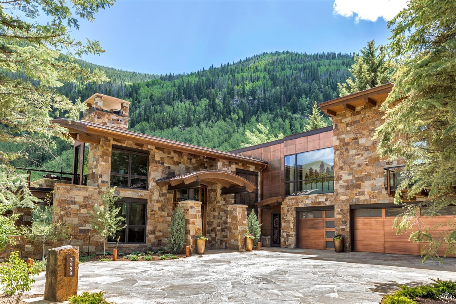 2950 Booth Creek Drive Vail, CO 81657 - Photo 3 of 25 a view of a house with a backyard