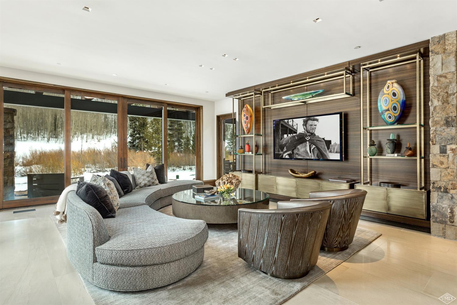 2950 Booth Creek Drive Vail, CO 81657 - Photo 8 of 25 a living room with furniture and a large window