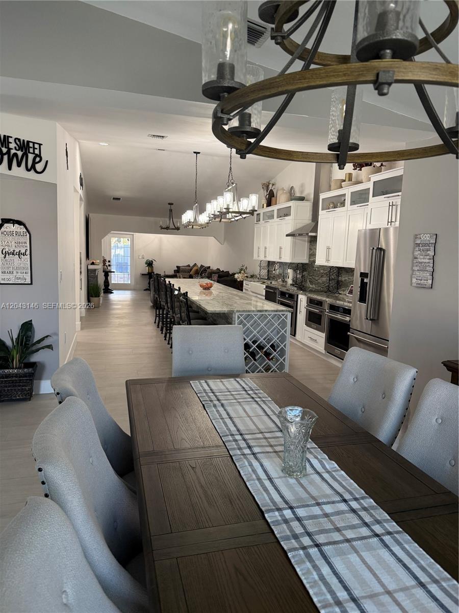 4947 Southwest 143rd Avenue Miami, FL 33175 - Photo 12 of 19 Dining, kitchen, and great room view. It's very spacious.