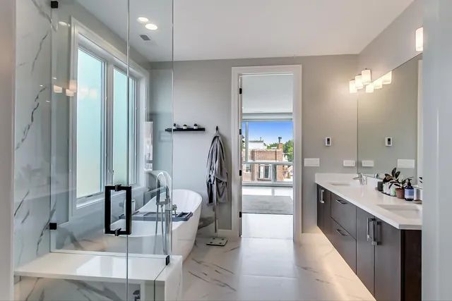 a bathroom with a double vanity sink