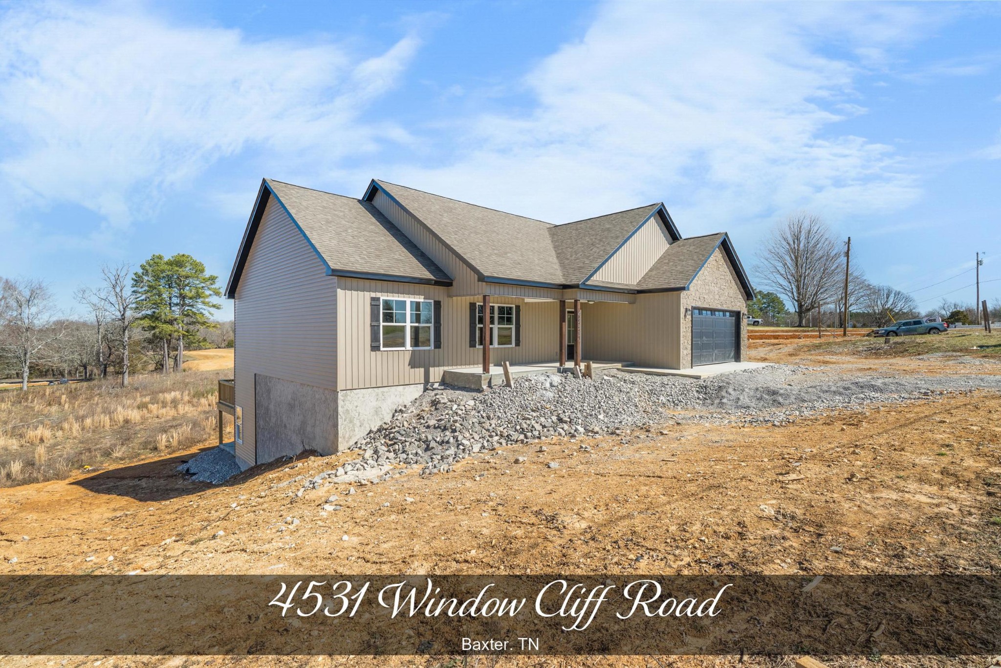 4531 Window Cliff Road Baxter, TN 38544 - Photo 1 of 31 a view of a house with wooden fence