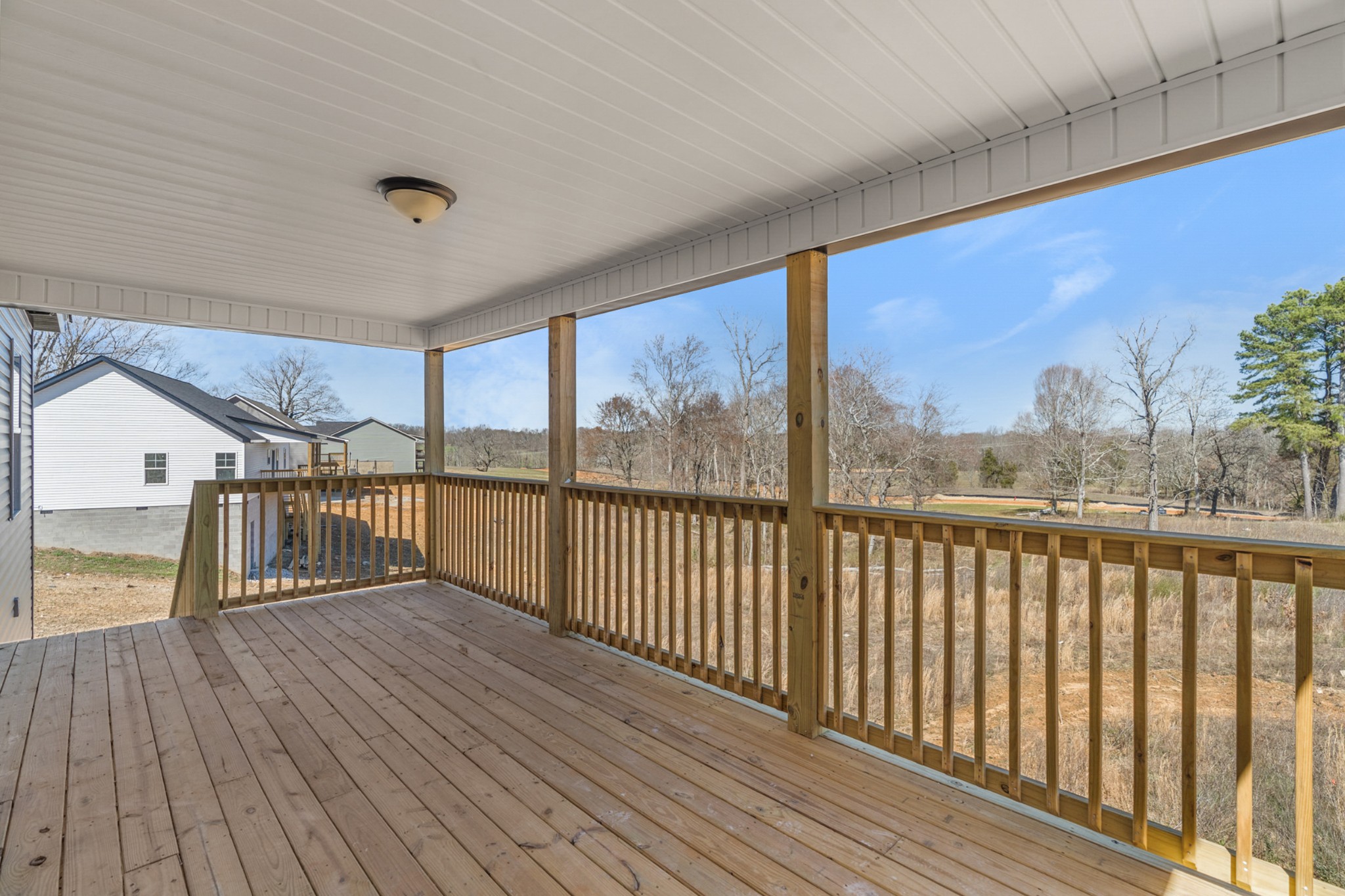 4531 Window Cliff Road Baxter, TN 38544 - Photo 8 of 31 a view of a balcony with wooden floor