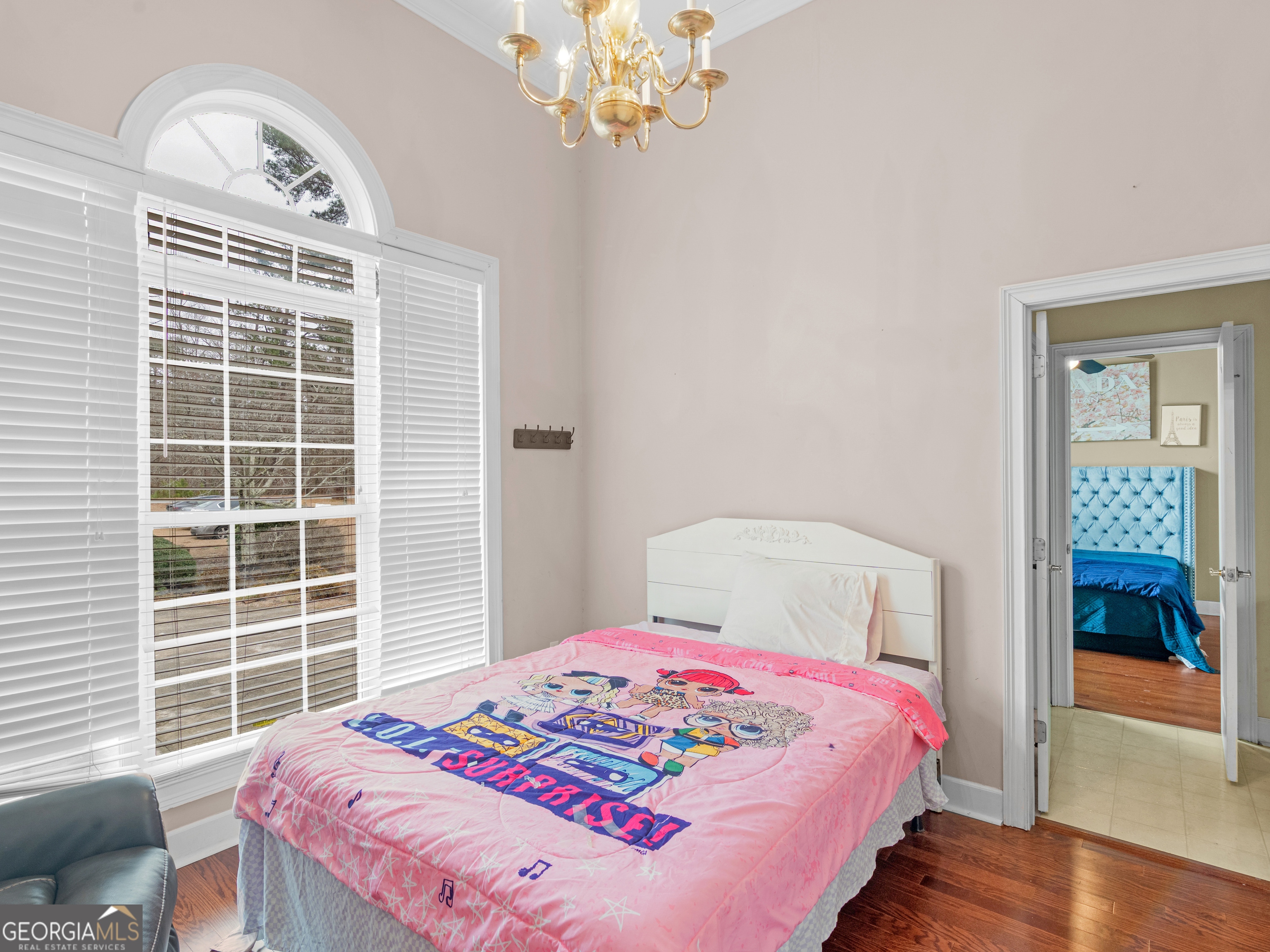517 North Pine Hill Road Griffin, GA 30223 - Photo 14 of 25 a bedroom with a bed and a window
