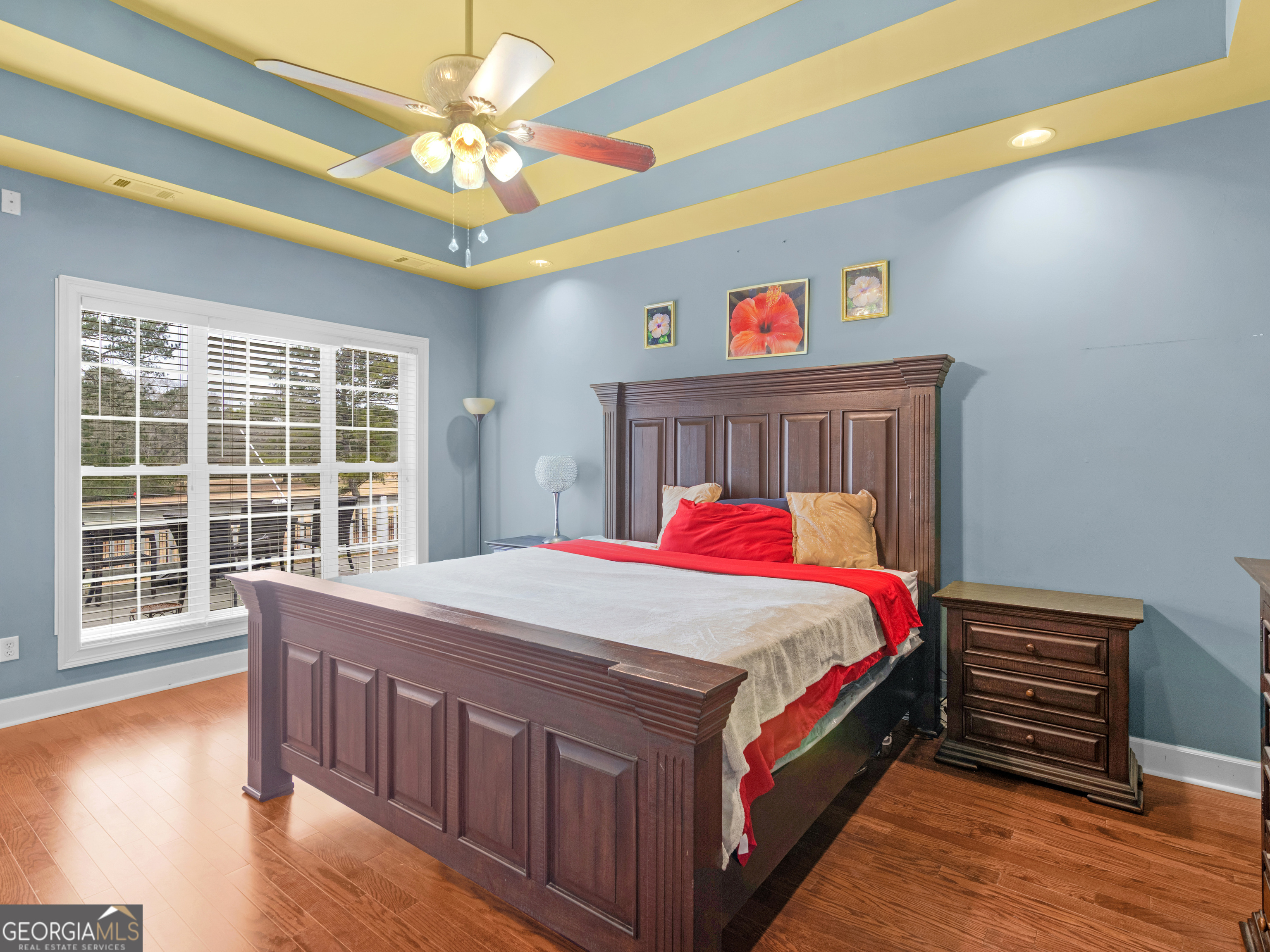 517 North Pine Hill Road Griffin, GA 30223 - Photo 5 of 25 a bed room with a bed and a large window