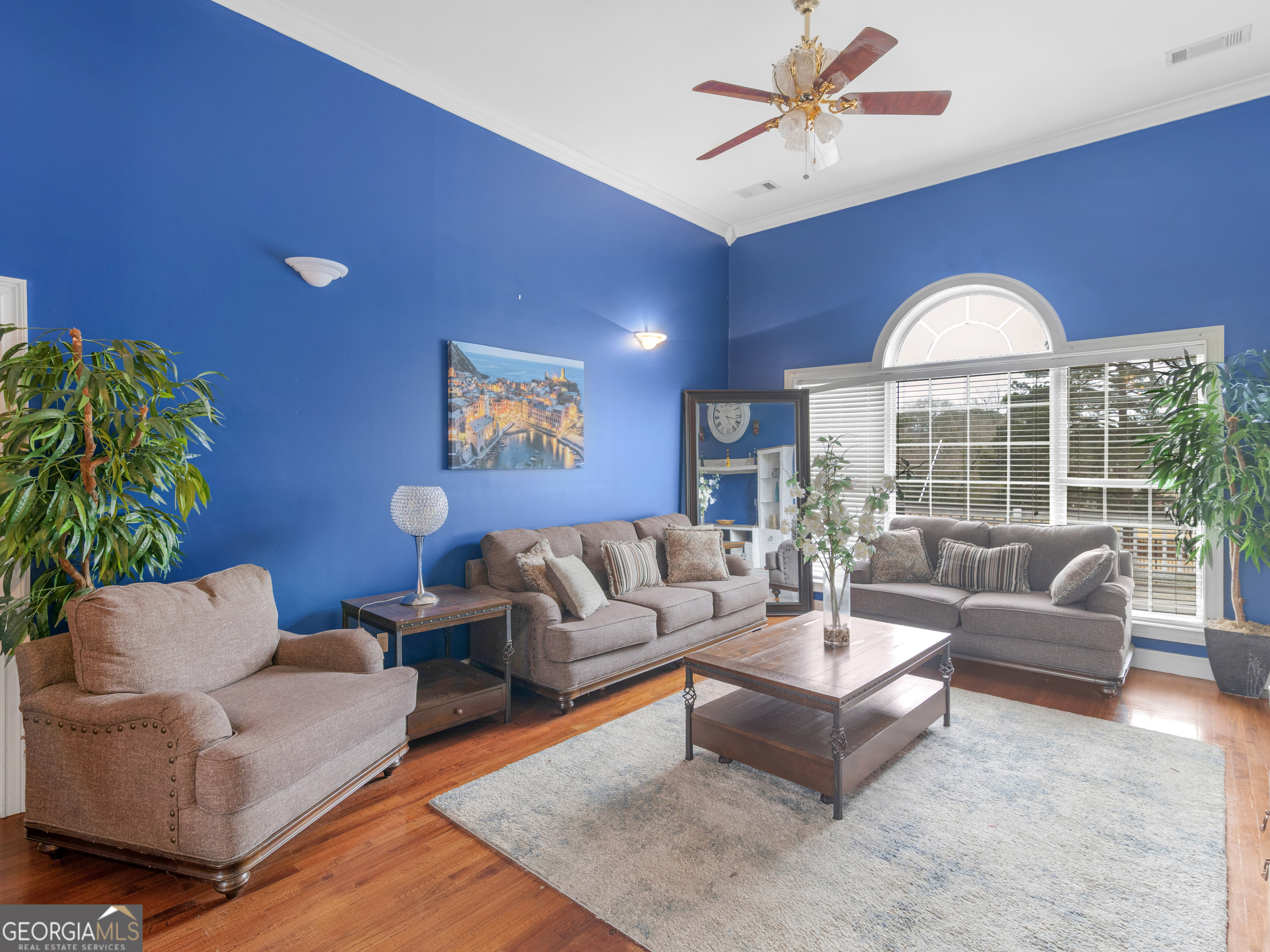 517 North Pine Hill Road Griffin, GA 30223 - Photo 9 of 25 a living room with furniture and a large window