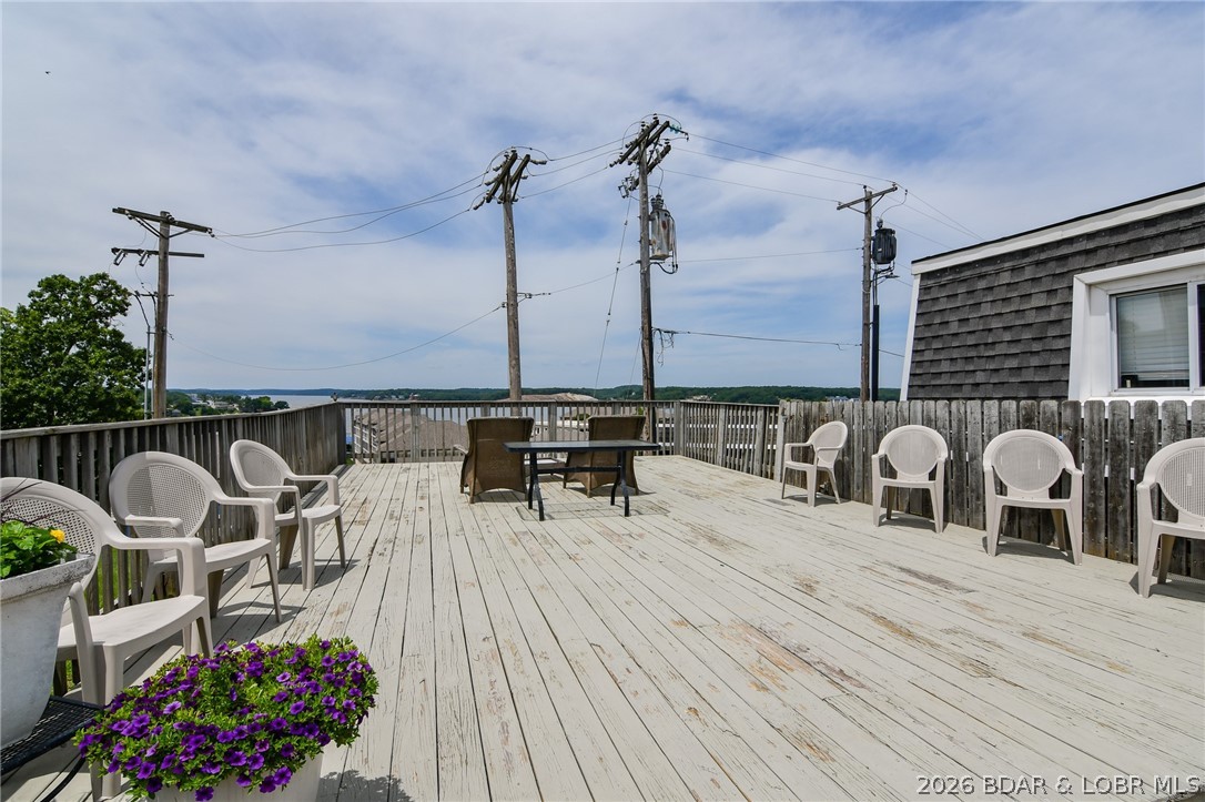 1118 Passover Road, Unit E216 Osage Beach, MO 65065 - Photo 26 of 31 Relax in the sun and soak in the lake views