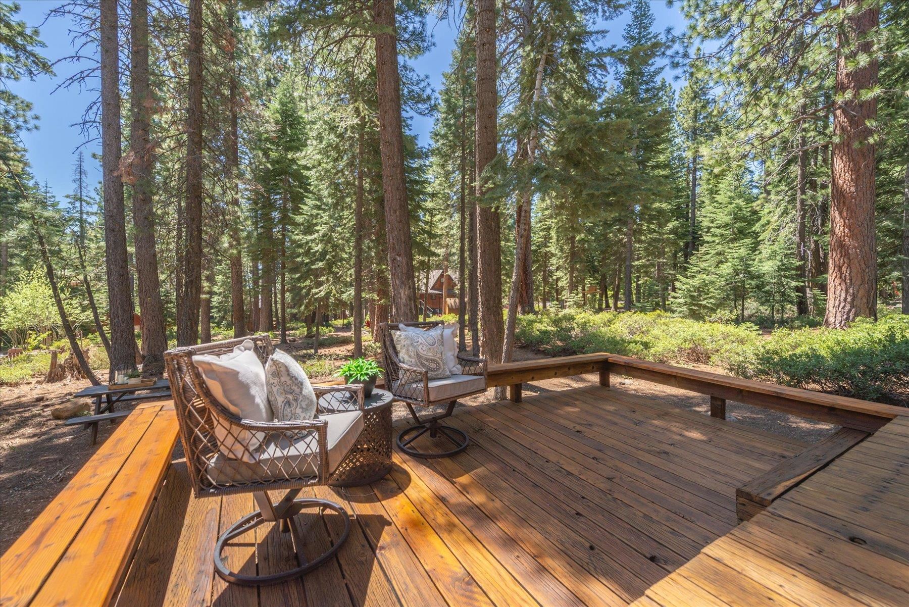 325 North Ridge Road Carnelian Bay, CA 96140 - Photo 5 of 22 a view of backyard with seating area and trees