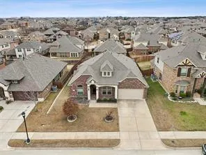 an aerial view of a residential houses