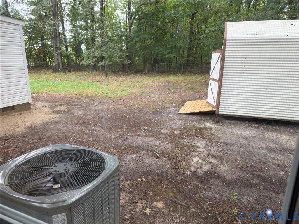 8207 Sebera Road Prince George, VA 23875 - Photo 26 of 27 Spacious outdoor grounds featuring mature tree-lin