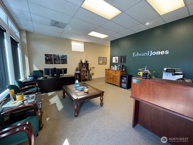 a room with furniture and a flat screen tv