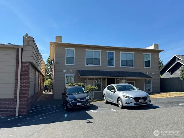 a car parked in front of a house