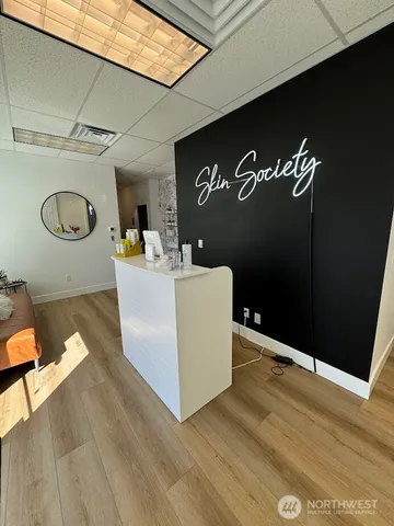 a view of a livingroom with furniture and window