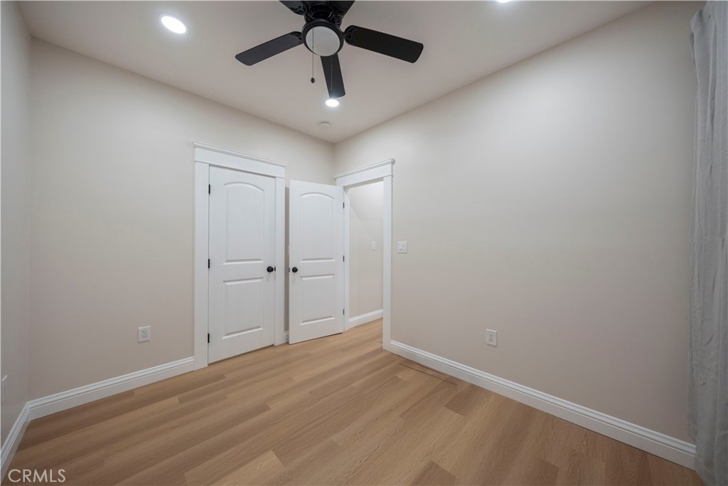 1820 2nd Street Long Beach, CA 90802 - Photo 11 of 16 an empty room with a empty space and a ceiling fan