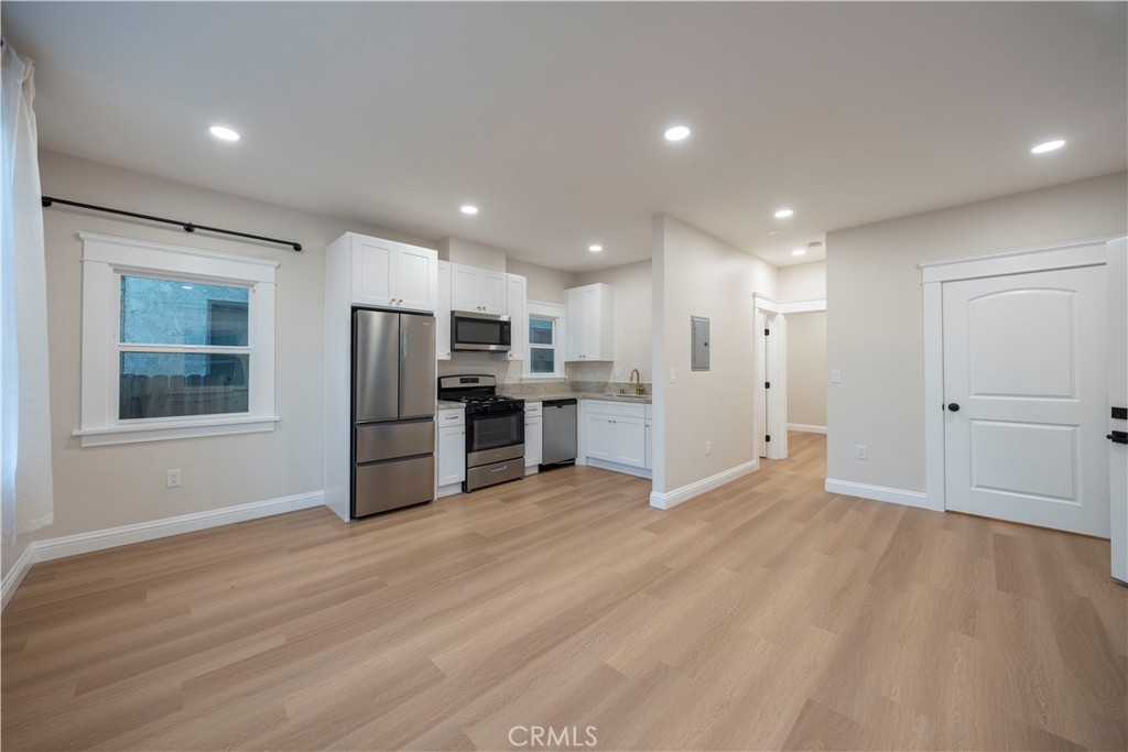 1820 2nd Street Long Beach, CA 90802 - Photo 8 of 16 a view of kitchen with stainless steel appliances refrigerator oven and microwave