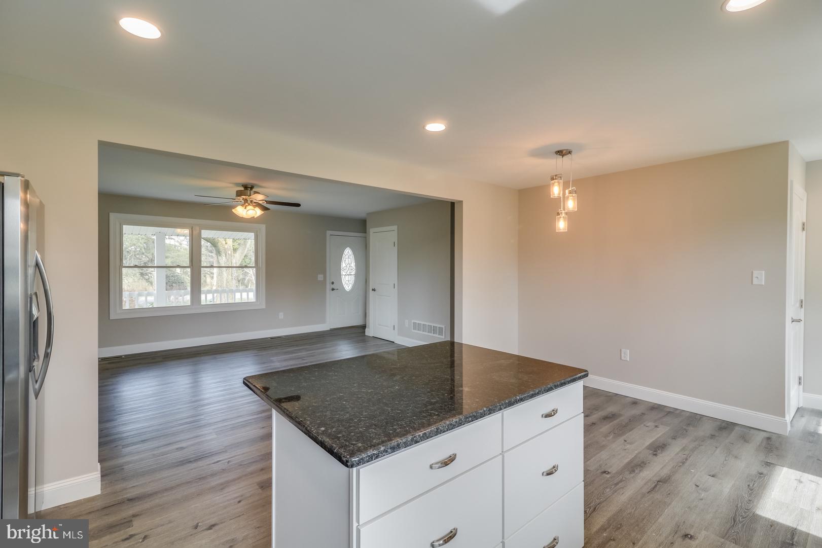 954 Vandyke Greenspring Road Townsend, DE 19734 - Photo 12 of 28 Kitchen Island & Eating Area
