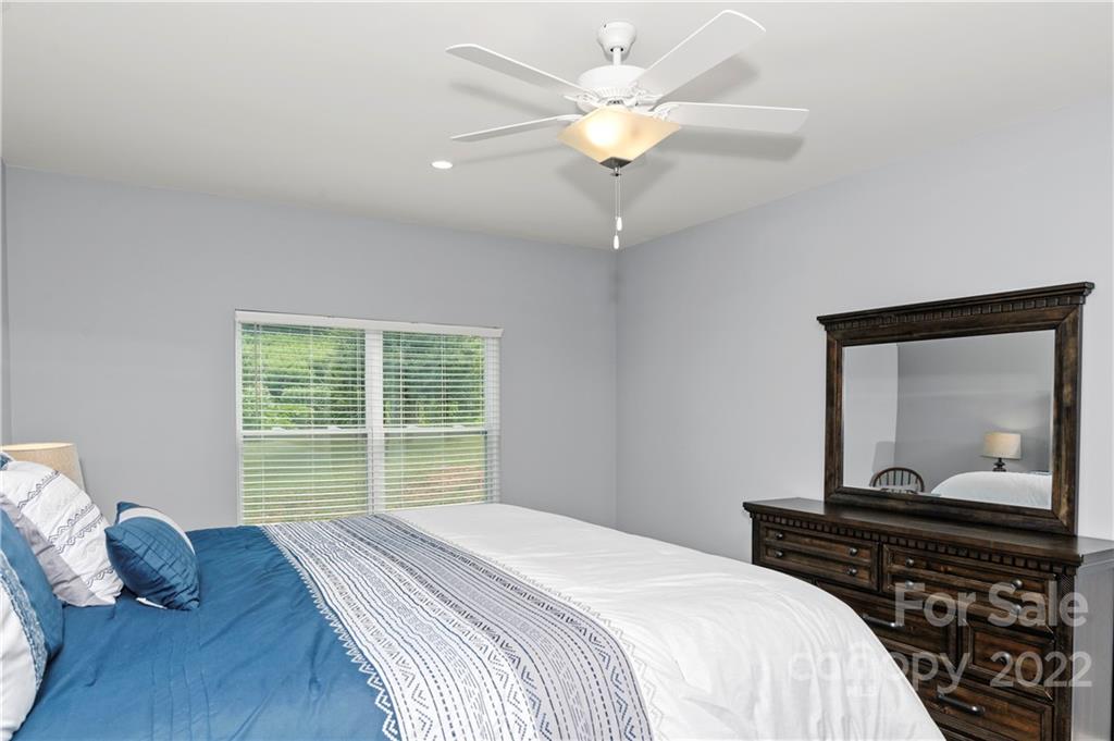 640 Pigeon Ford Road Canton, NC 28716 - Photo 12 of 30 a bedroom with a bed and a window