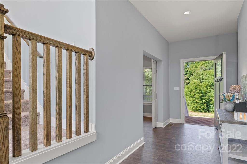 640 Pigeon Ford Road Canton, NC 28716 - Photo 16 of 30 a view of a porch with wooden floor and stairs