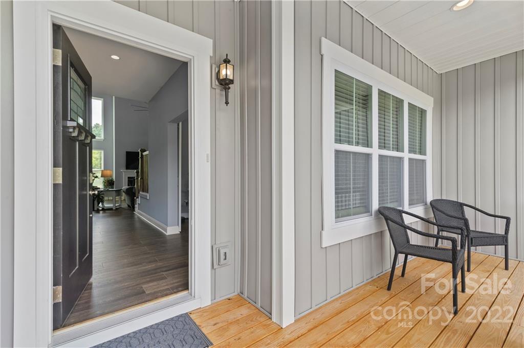 640 Pigeon Ford Road Canton, NC 28716 - Photo 2 of 30 a view of a livingroom with wooden floor and furniture
