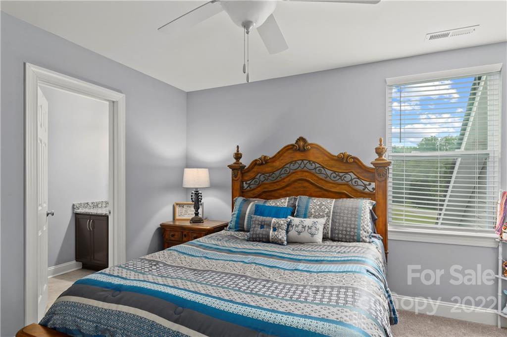 640 Pigeon Ford Road Canton, NC 28716 - Photo 24 of 30 a bedroom with a bed and a window
