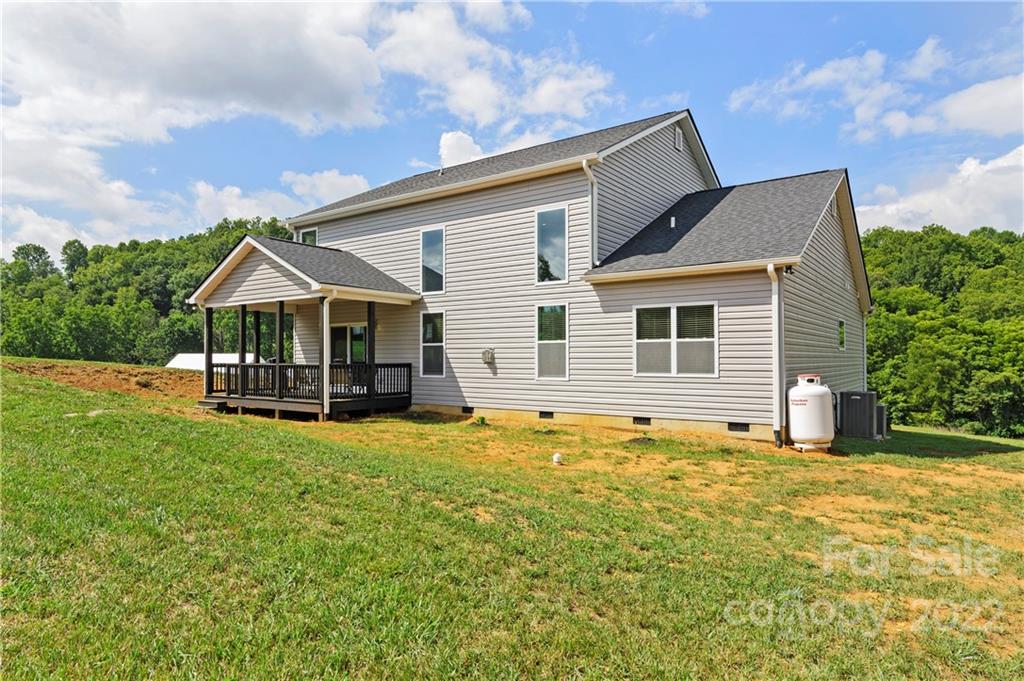 640 Pigeon Ford Road Canton, NC 28716 - Photo 27 of 30 a view of a house with a yard and sitting area