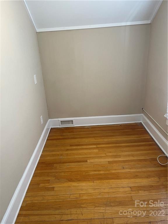 607 Salisbury Road Statesville, NC 28677 - Photo 15 of 20 a view of room with wooden floor