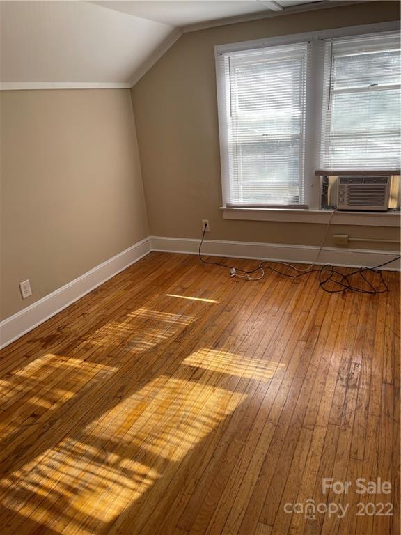 607 Salisbury Road Statesville, NC 28677 - Photo 8 of 20 a view of a room with wooden floor and cabinet