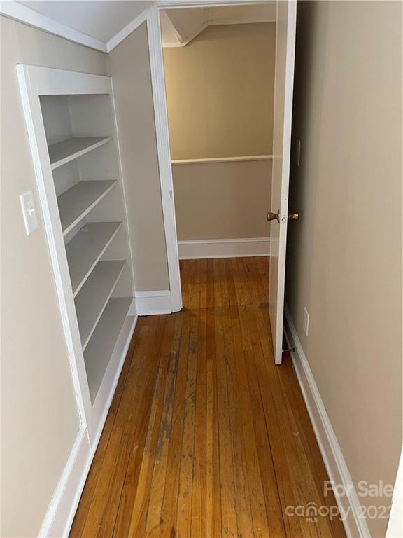 607 Salisbury Road Statesville, NC 28677 - Photo 10 of 20 a view of walk in closet with wooden floor