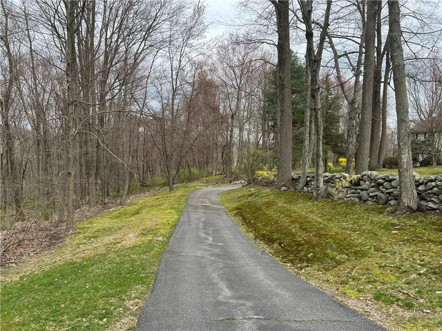 a view of swimming pool with a yard