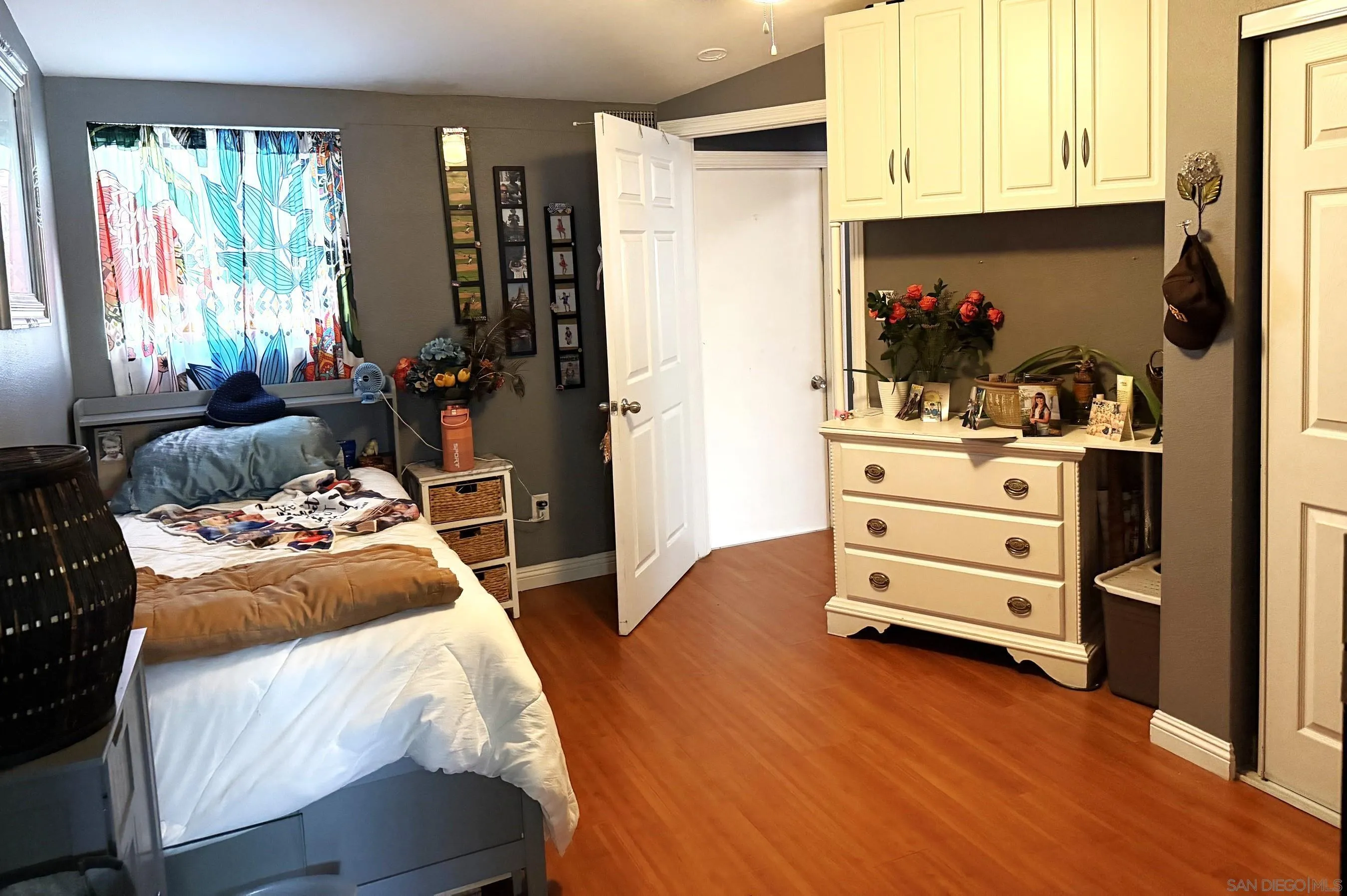 12923 Slack Street Poway, CA 92064 - Photo 16 of 29 a bedroom with a bed and a window