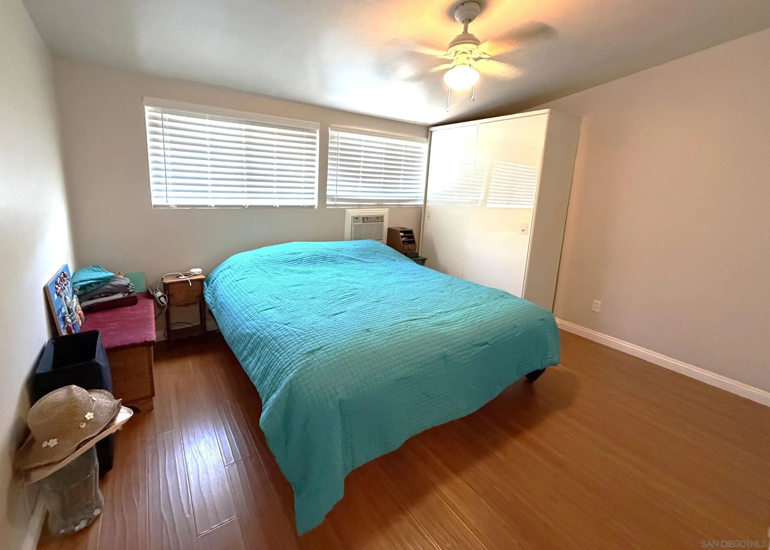 12923 Slack Street Poway, CA 92064 - Photo 18 of 29 a bed sitting in a bedroom next to a window