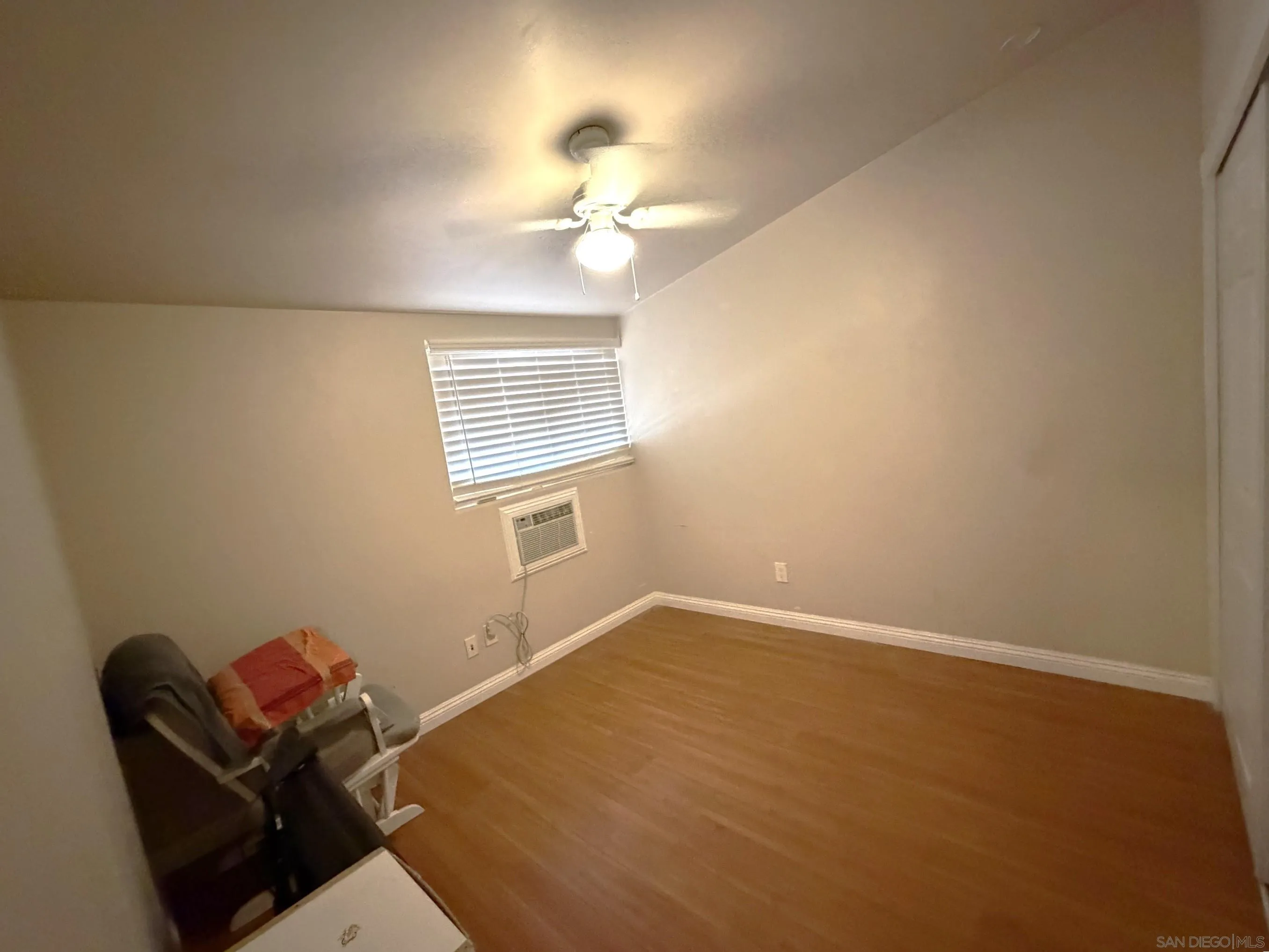 12923 Slack Street Poway, CA 92064 - Photo 22 of 29 a view of a livingroom with a window