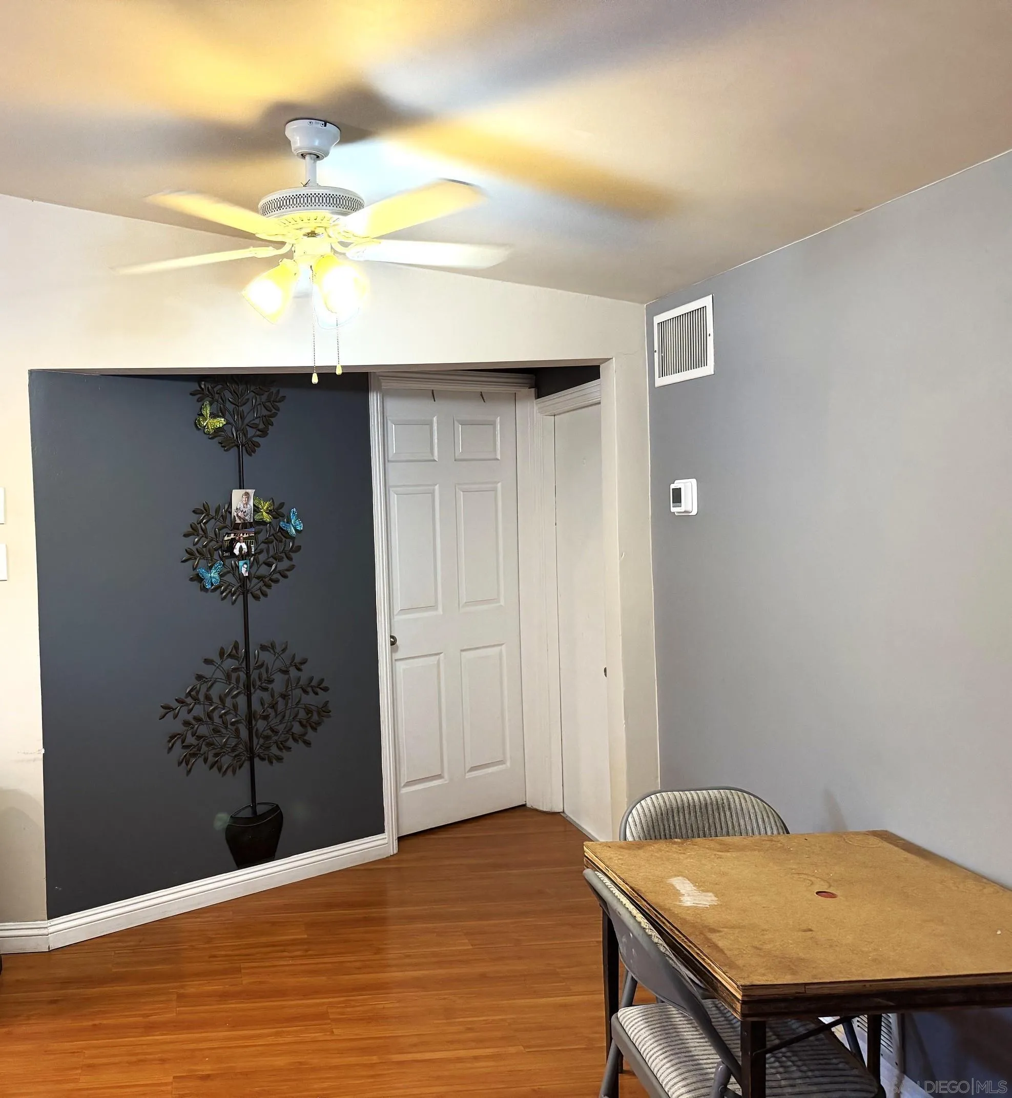 12923 Slack Street Poway, CA 92064 - Photo 6 of 29 a view of a room with a table and chandelier