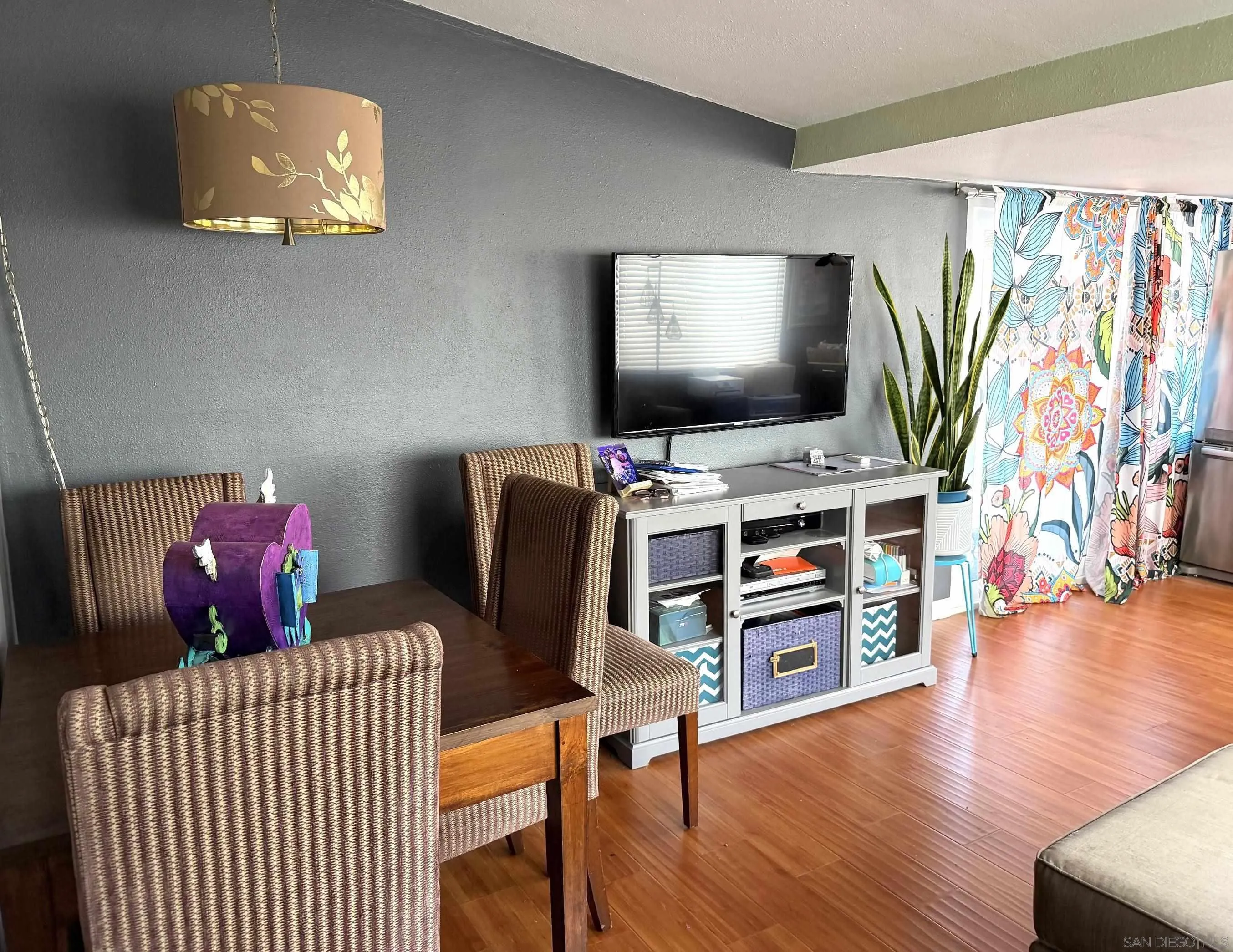 12923 Slack Street Poway, CA 92064 - Photo 9 of 29 a view of a livingroom with furniture and a flat screen tv