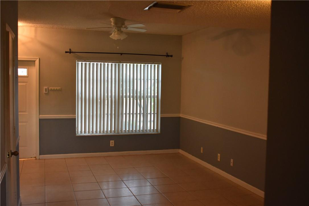 7890 Dixie Beach Circle Tamarac, FL 33321 - Photo 13 of 19 a view of an empty room with a window
