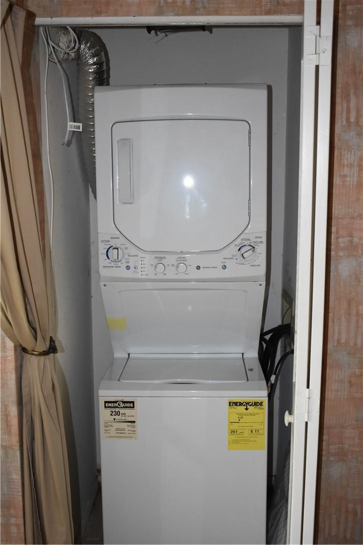 7890 Dixie Beach Circle Tamarac, FL 33321 - Photo 14 of 19 a utility room with dryer and washer