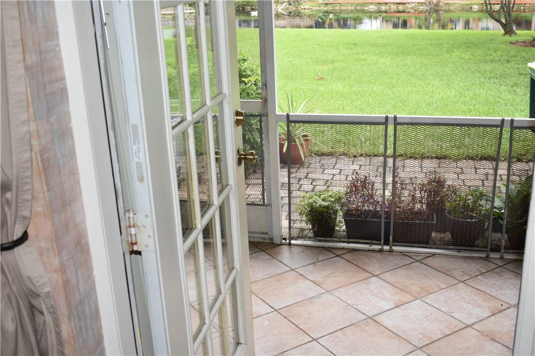 7890 Dixie Beach Circle Tamarac, FL 33321 - Photo 5 of 19 a view of outdoor space with backyard