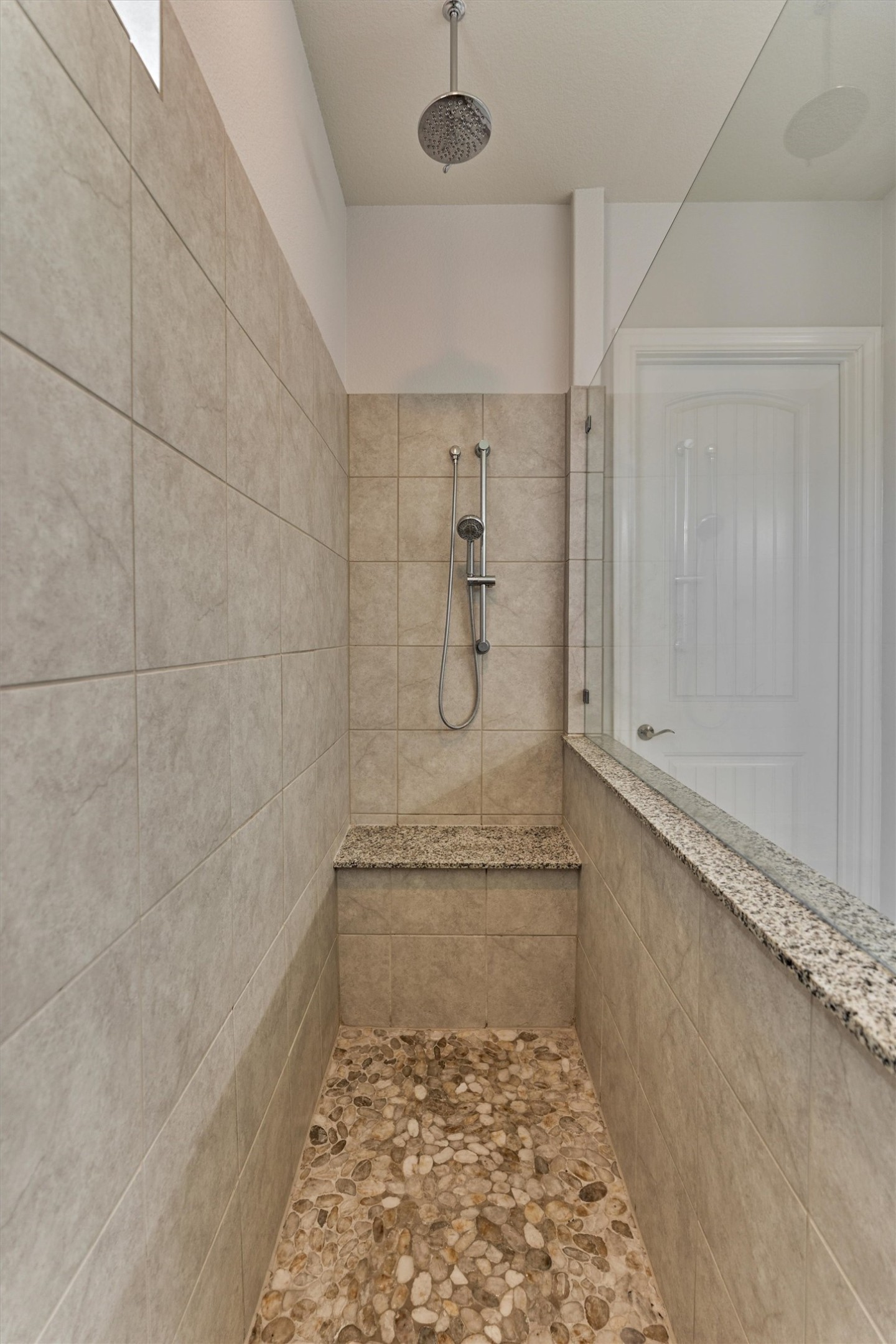 108 Wild Wick Way Spring, TX 77382 - Photo 27 of 44 The Shower Also Offers A Bench Seat And Plenty Of Space To Store Your Personal Shower Products.