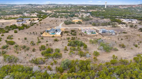 a aerial view of a house with a yard