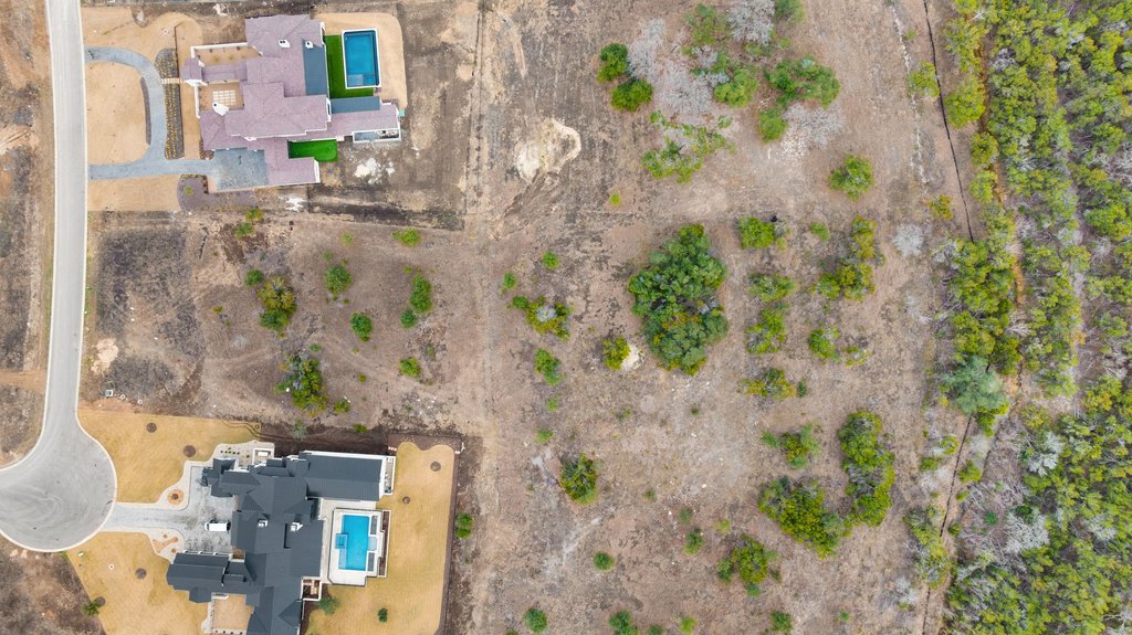 5408 Spring Preserve Trail Bee Cave, TX 78738 - Photo 12 of 40 a aerial view of a house with a yard