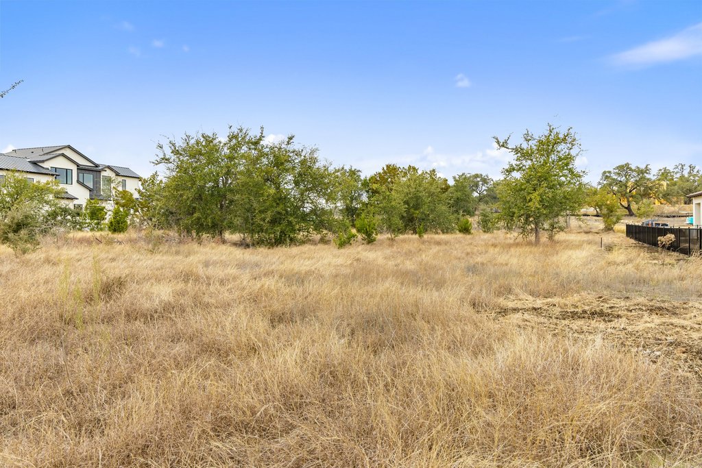 5408 Spring Preserve Trail Bee Cave, TX 78738 - Photo 35 of 40 a view of a yard with a house