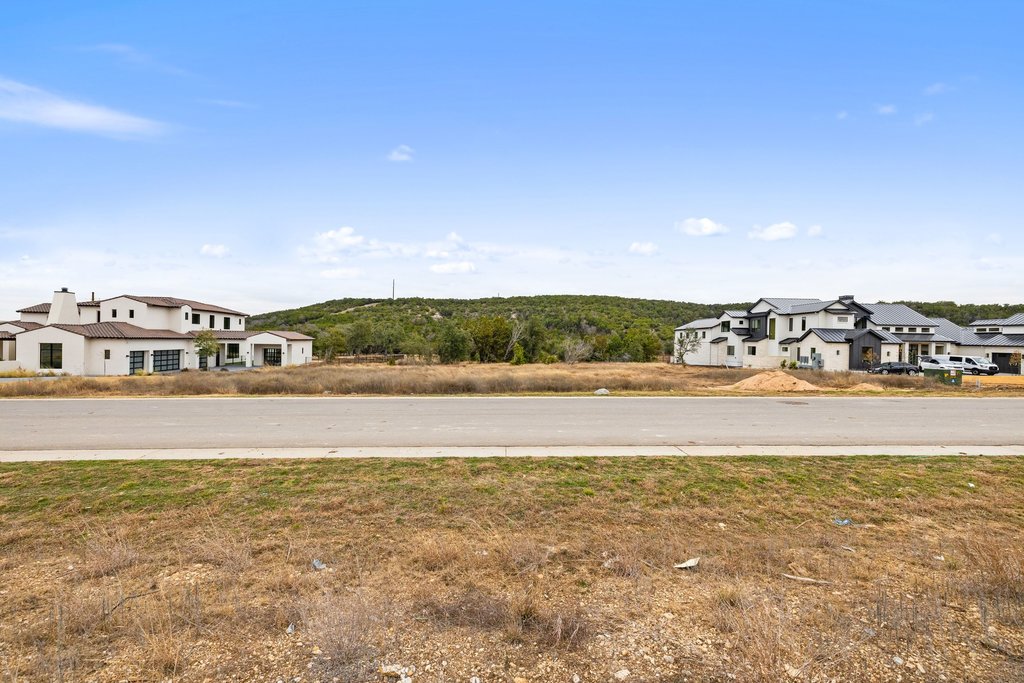 5408 Spring Preserve Trail Bee Cave, TX 78738 - Photo 39 of 40 a view of an ocean and houses