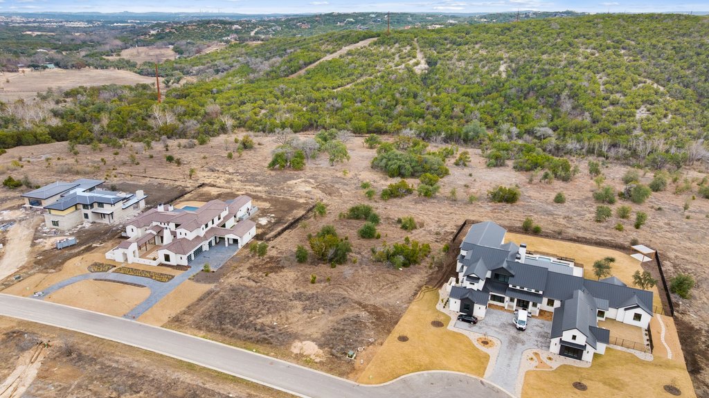 5408 Spring Preserve Trail Bee Cave, TX 78738 - Photo 9 of 40 an aerial view of residential houses with outdoor space