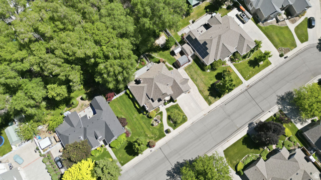 883 East 700 South Springville, UT 84663 - Photo 57 of 59 Aerial perspective showcasing a residential street with mature landscaping