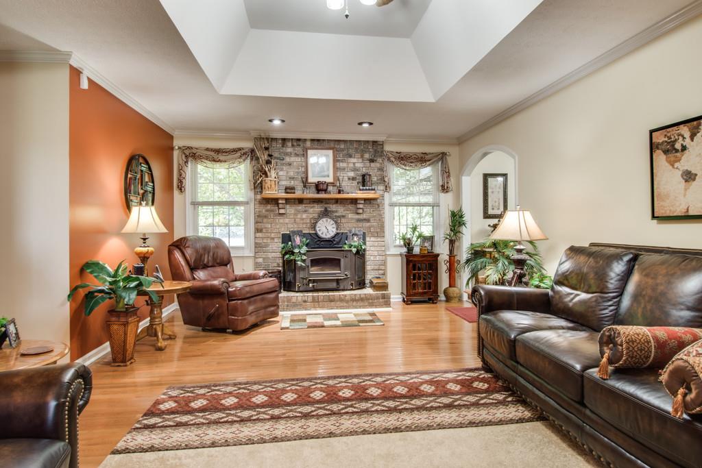 4850 Mt Zion Road Springfield, TN 37172 - Photo 4 of 28 a living room with furniture hard wood floor and a rug