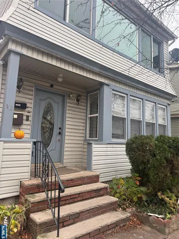 a front view of a house with balcony