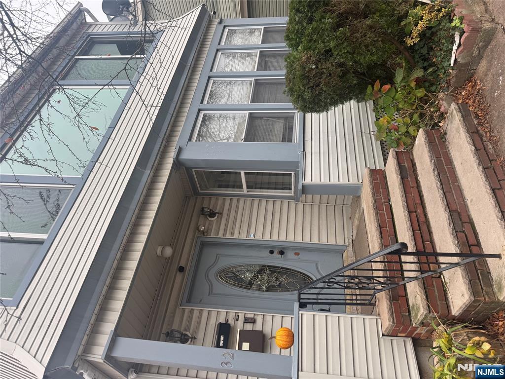 a front view of a house with balcony