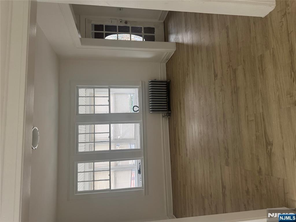 32 Jacoby Street, Unit 1 Maplewood, NJ 07040 - Photo 2 of 14 a view of an empty room with a window