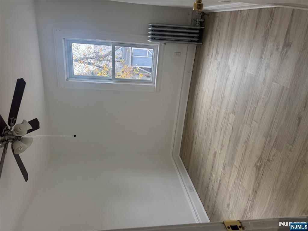 32 Jacoby Street, Unit 1 Maplewood, NJ 07040 - Photo 10 of 14 an empty room with a window